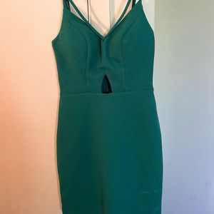 green body con dress with cross front straps and adjustable back straps
